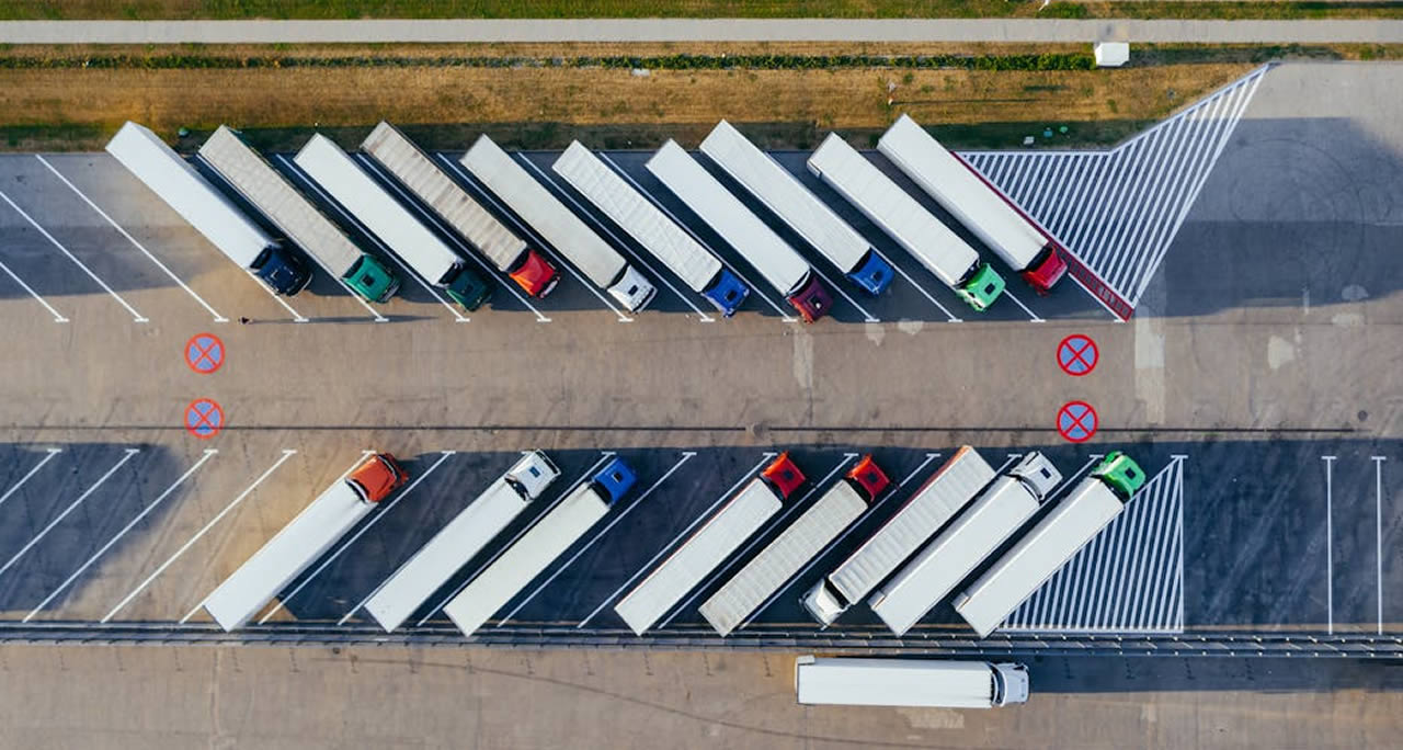 Aerial Photography Of Trucks Parked
